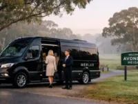 Van at Avondale Heights welcome sign