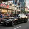 F1 Merchandise Megastore Transfers Melbourne luxury chauffeur Mercedes near Albert Park during Australian Grand Prix
