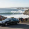 Rip Curl Pro chauffeur Melbourne luxury car arriving at Bells Beach surfing event