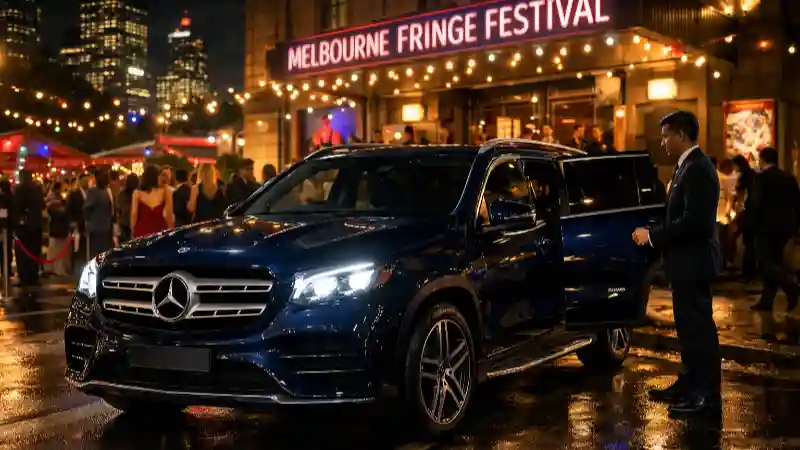 Melbourne Fringe Festival Chauffeur Service luxury Mercedes SUV arriving at Melbourne arts festival venue at night