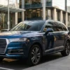 Business SUV chauffeur Melbourne service with a professional chauffeur beside a deep-blue executive SUV